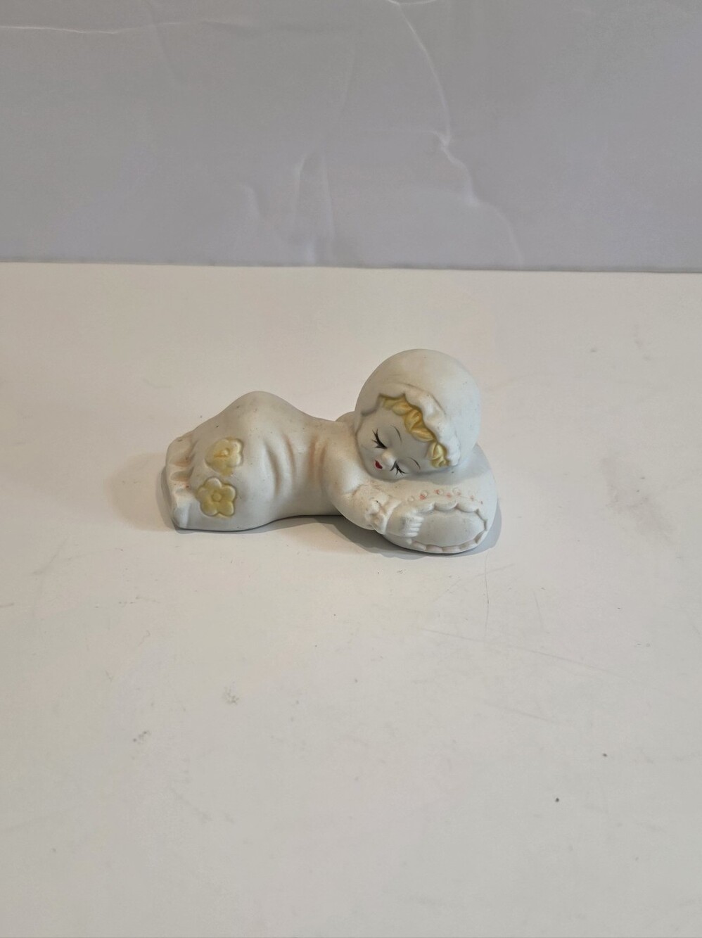 Vintage Porcelain Sleeping Baby Figurine in White and Cream